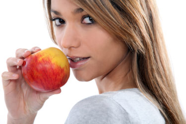 brunette with apple